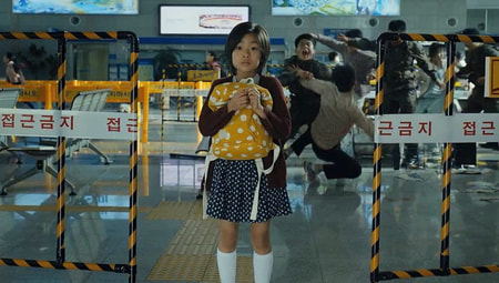 Su-an in Train to Busan. We watch the film through the eyes of the young girl